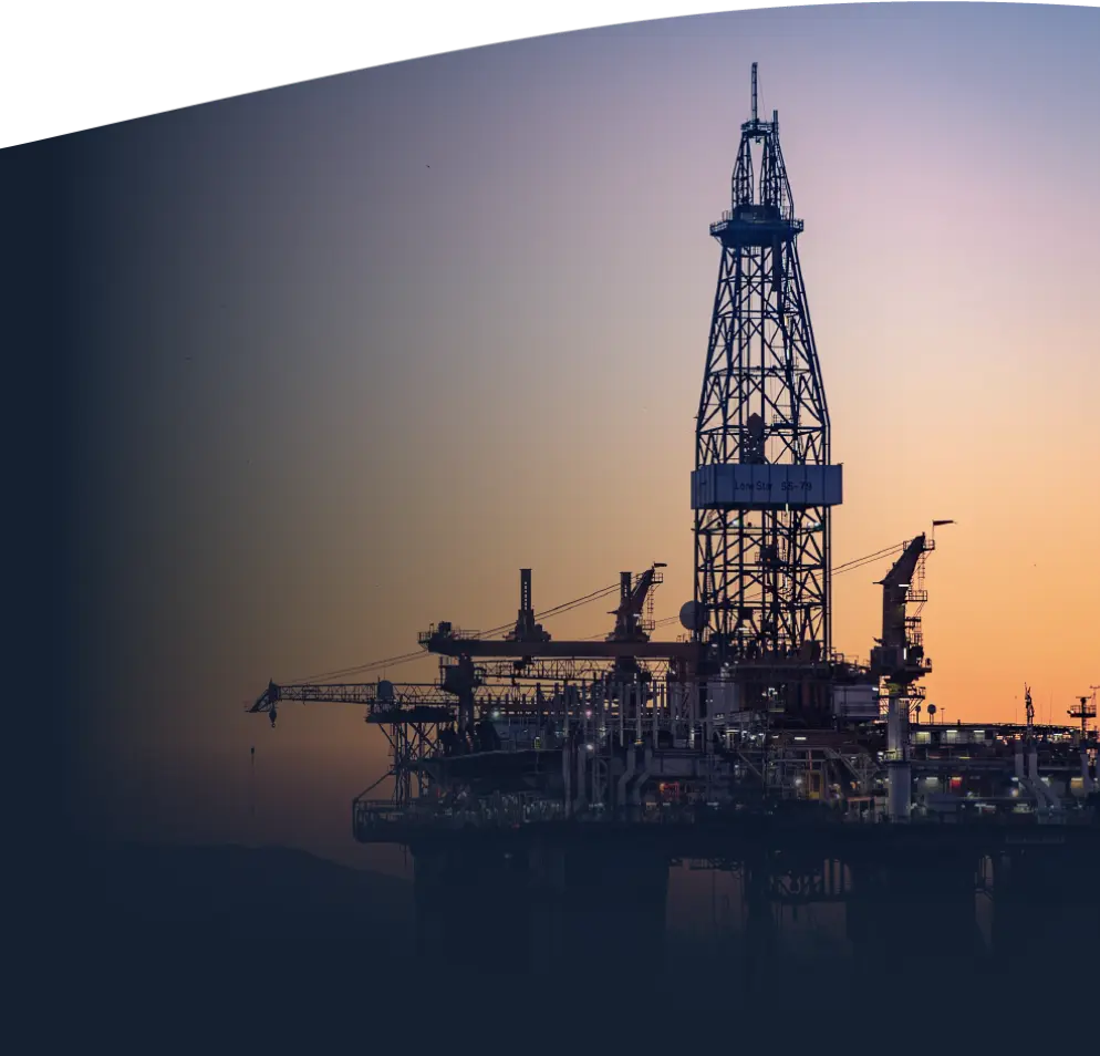 Offshore oil platform at sunset